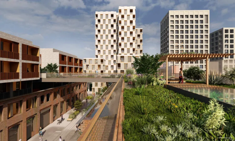 Zachowany budynek poprzemysłowy w centrum zespołu, zielony taras na dachu i pieszy pasaż między zabudową.